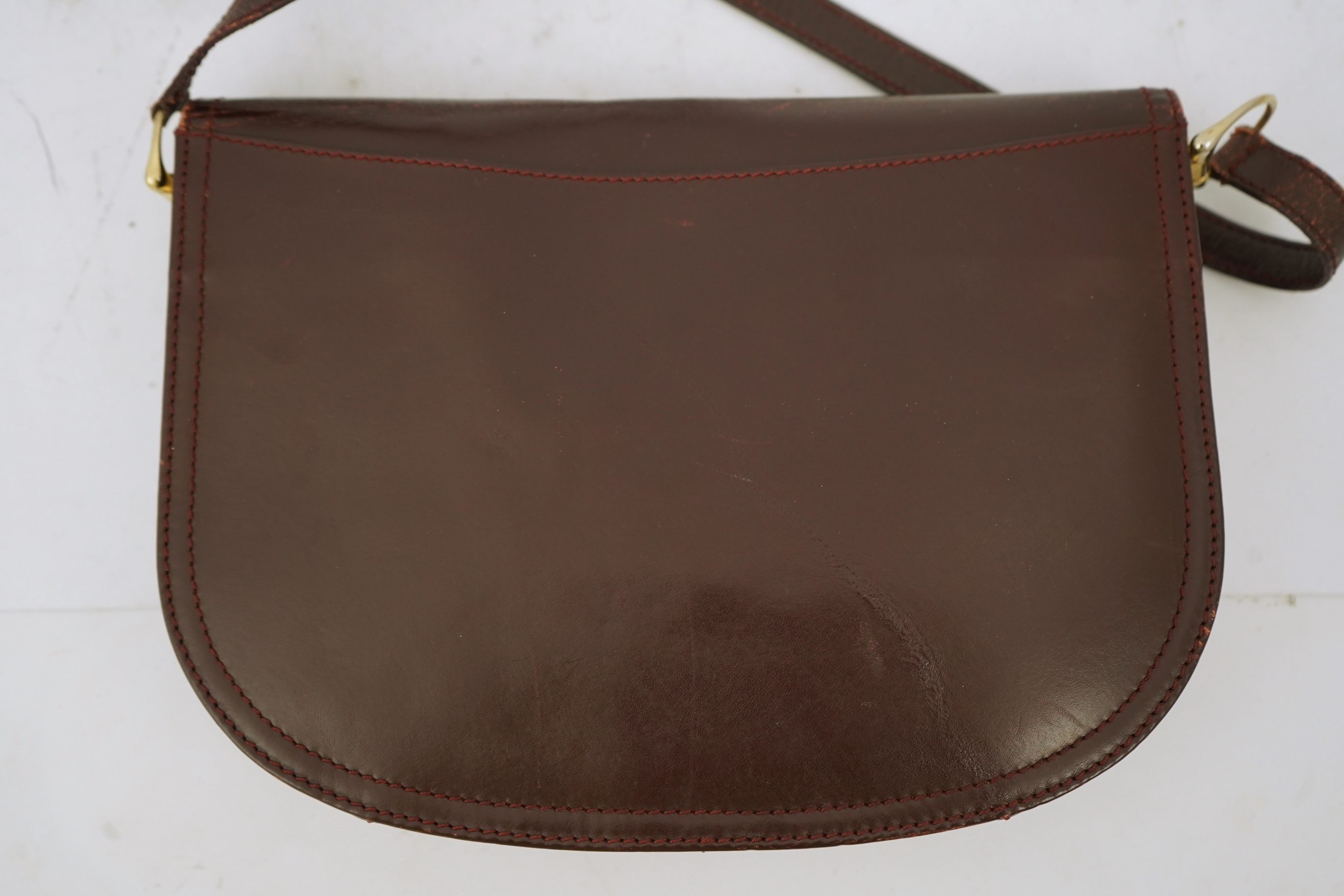 A Cartier leather shoulder bag